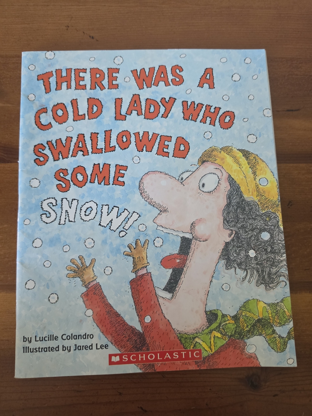 There Was a Cold Lady Who Swallowed Some Snow! - Children's Book (Blue, Red)